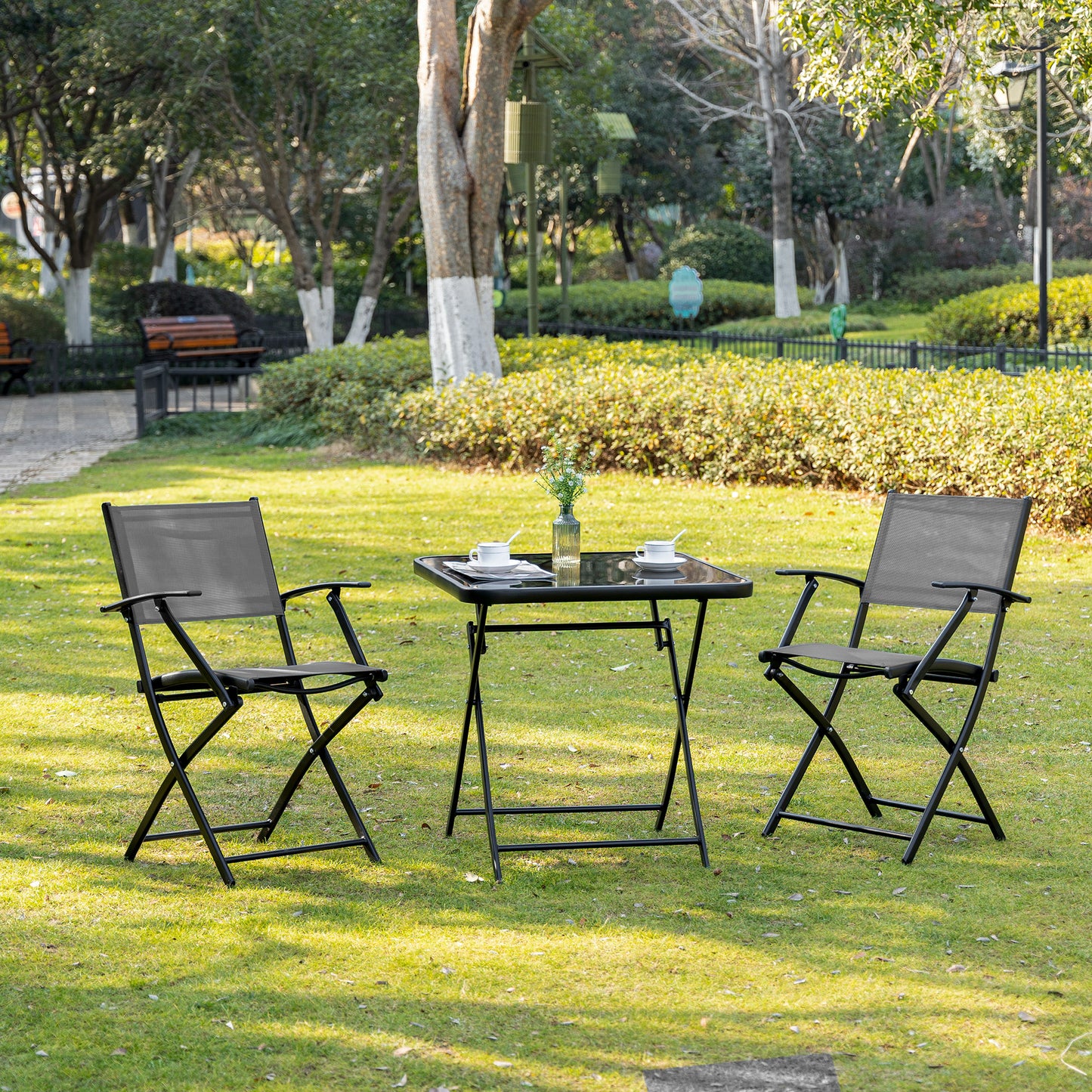 Folding balcony set with table and 2 chairs, made of black and grey metal mesh, suitable for gardens and terraces
