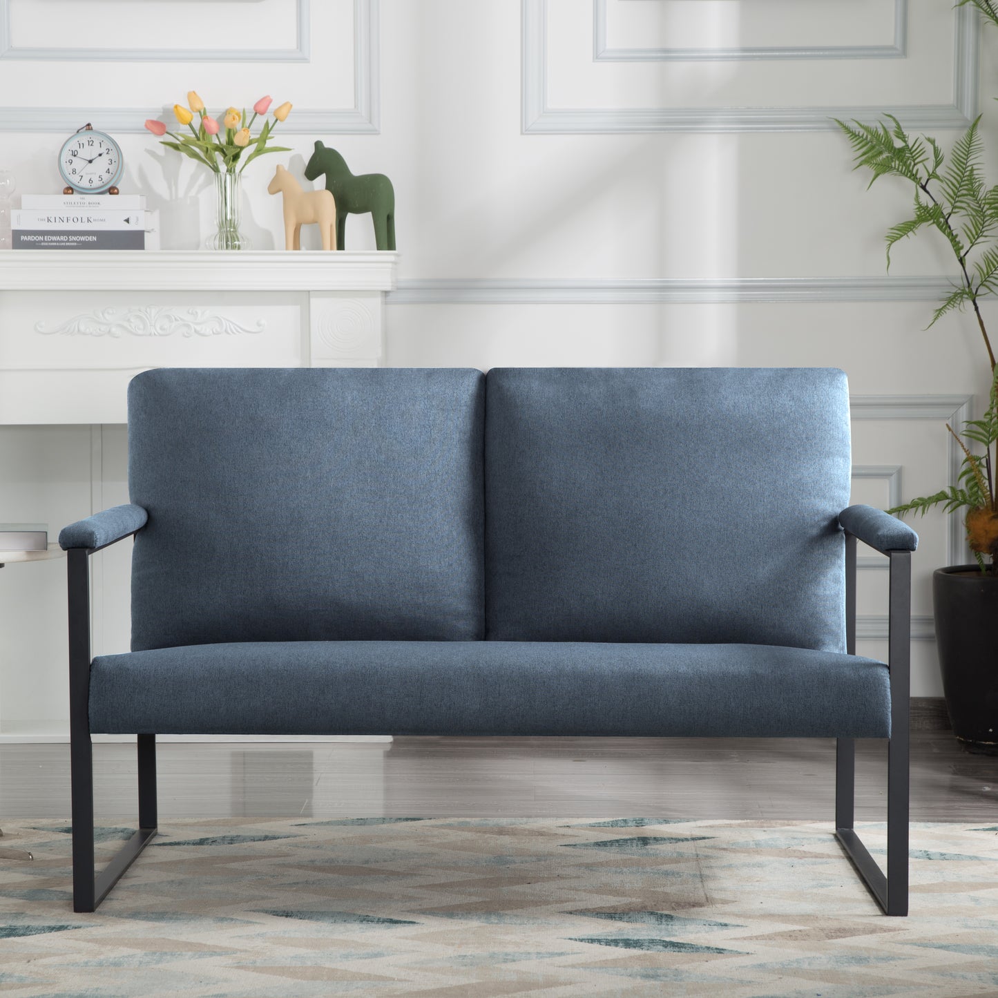 A simple - optimized double - seater sofa with a metal frame.